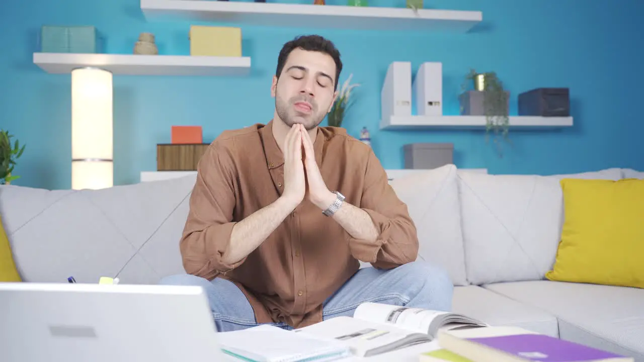 Young man praying for success