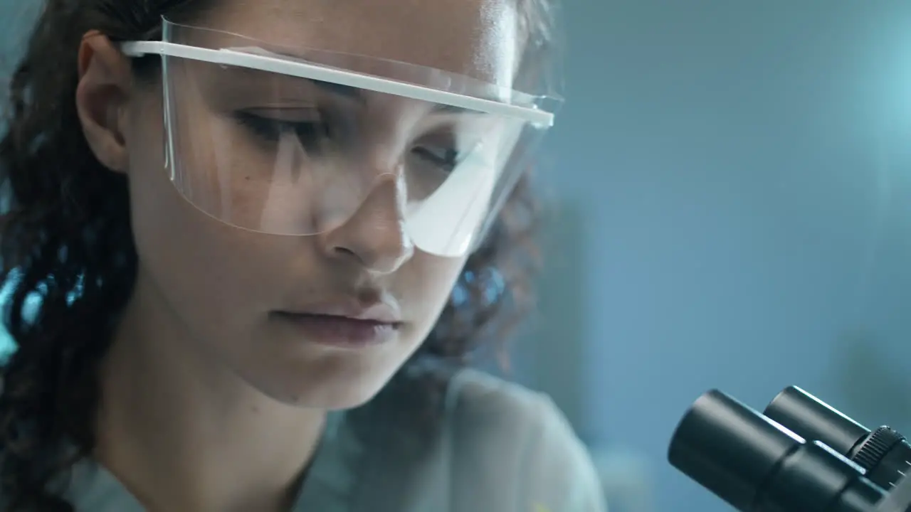 Female Biologist Doing Plant Research in Lab