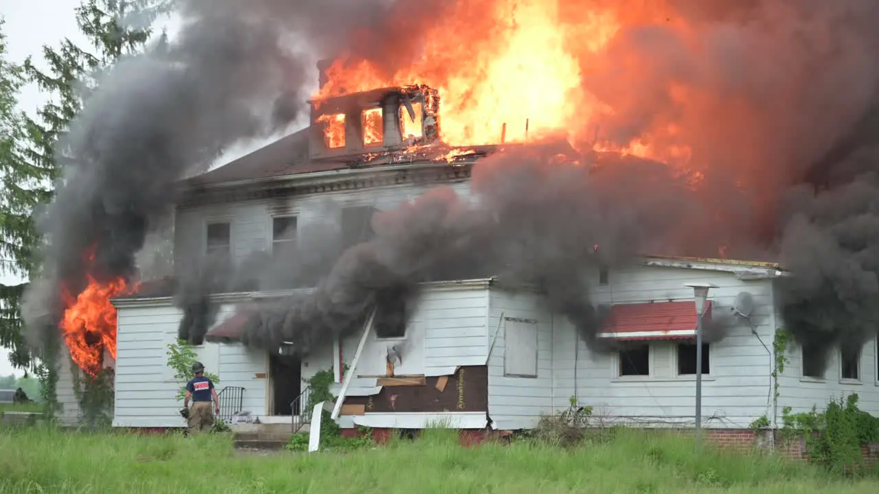 House fully engulfed in flames