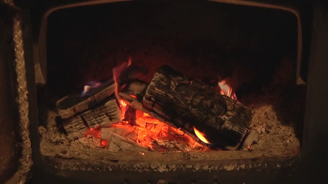 Wood Burning Stove with burning logs UK