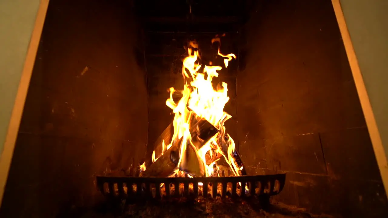 Wood burning in a fireplace in SlowMotion HD