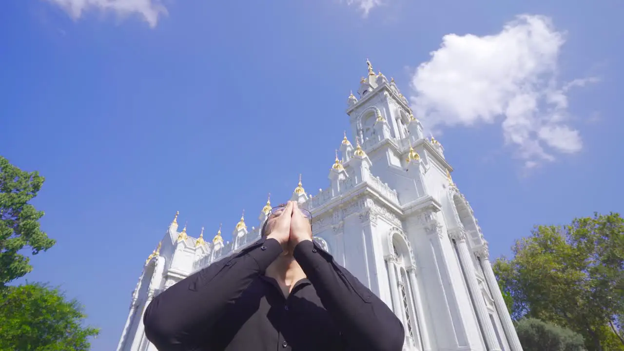 Christian person praying in church