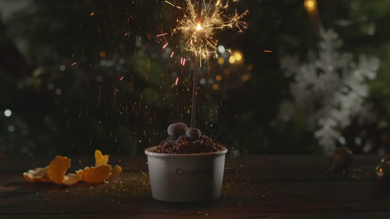 Christmas dessert with confetti and sparkler