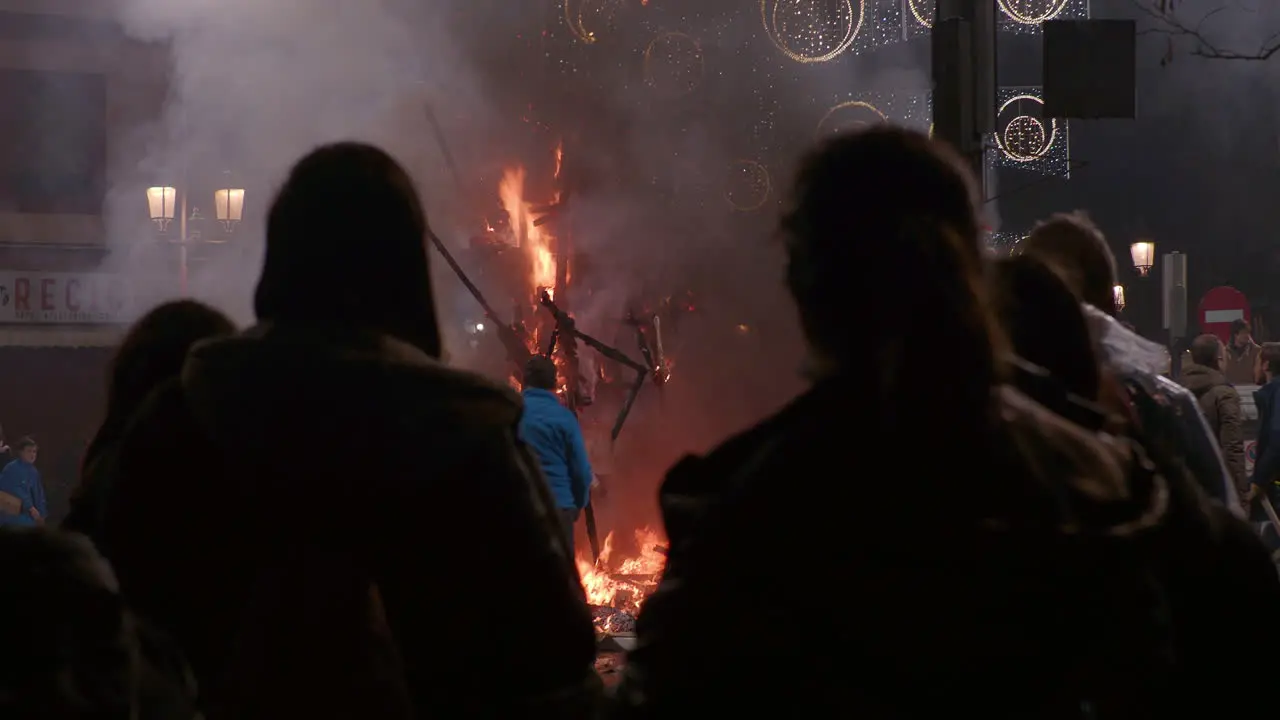 People gathering to look at ninot burning during Fallas festival Spain