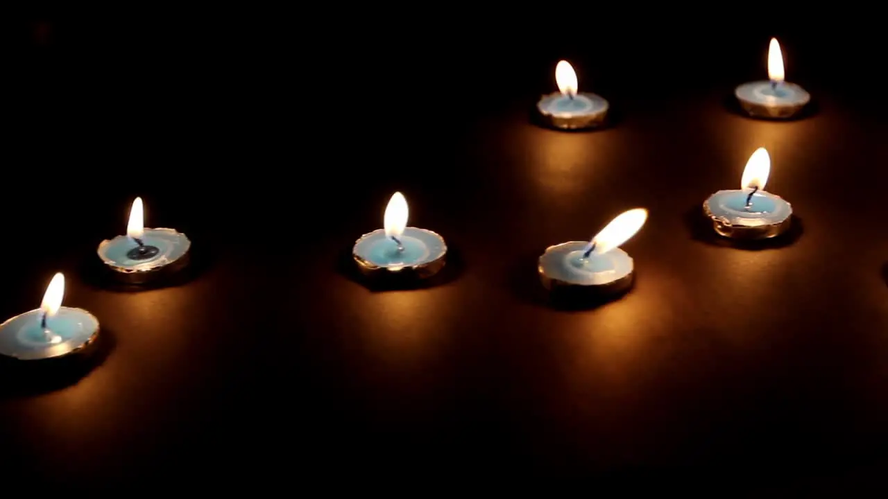 Burning Candles Black Background Slider