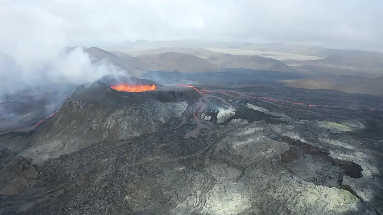 Aerial view of Fagradalsfjall volcano in Iceland spewing lava and smoke