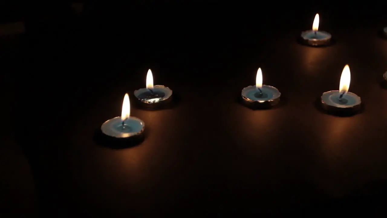 Burning Candles Black Background Slider 1