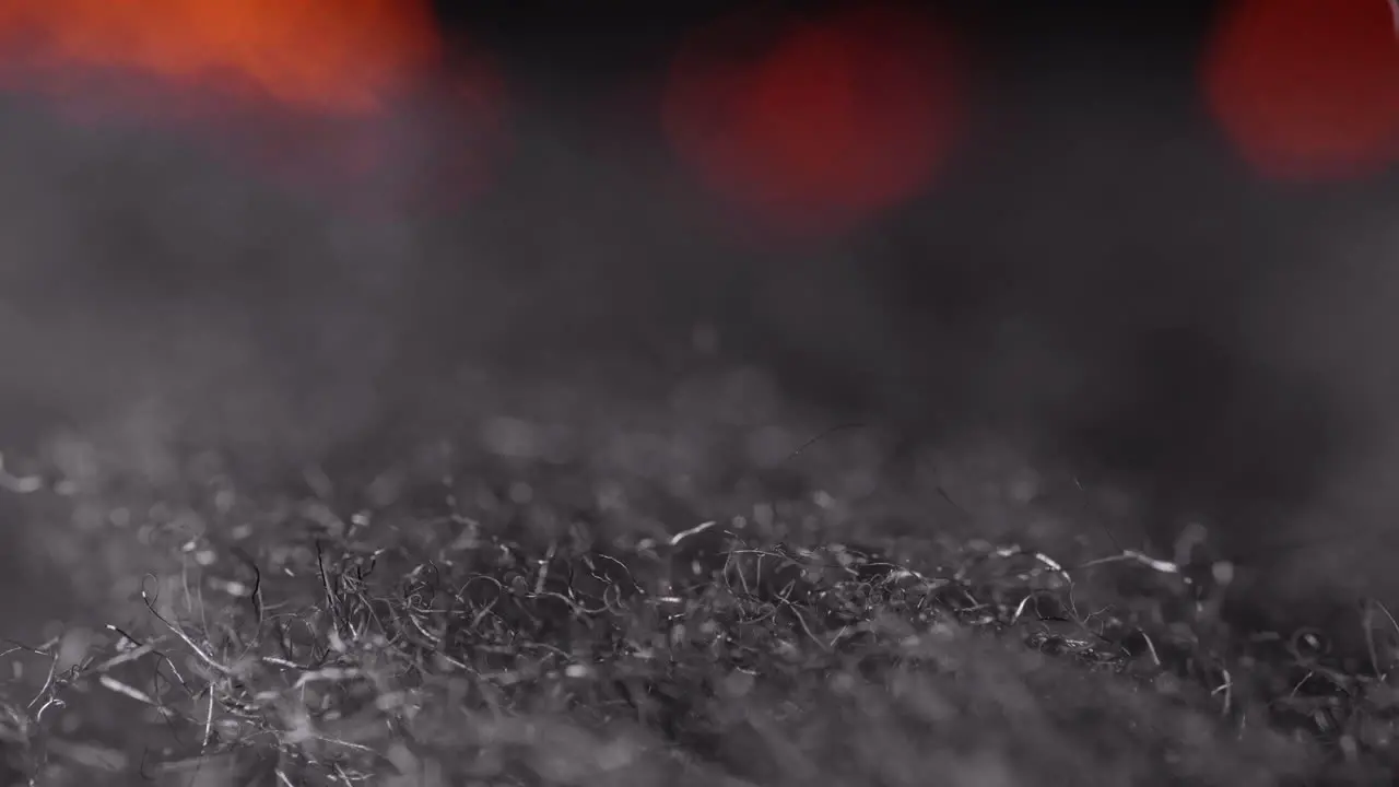 Fire Crawls Rapidly And Sparks Jump Into Bed Of Curly Strands Of Burning Steel Wool