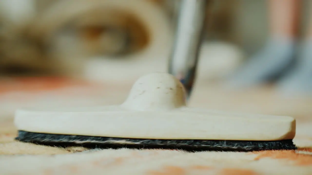 Housewife Vacuums Carpet In His House Video With Low Depth Of Field