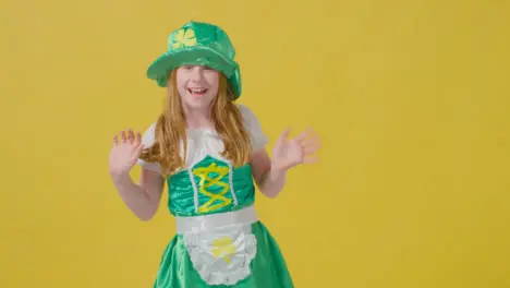 Mid Shot of Little Girl Saying Happy St Patrick's Day