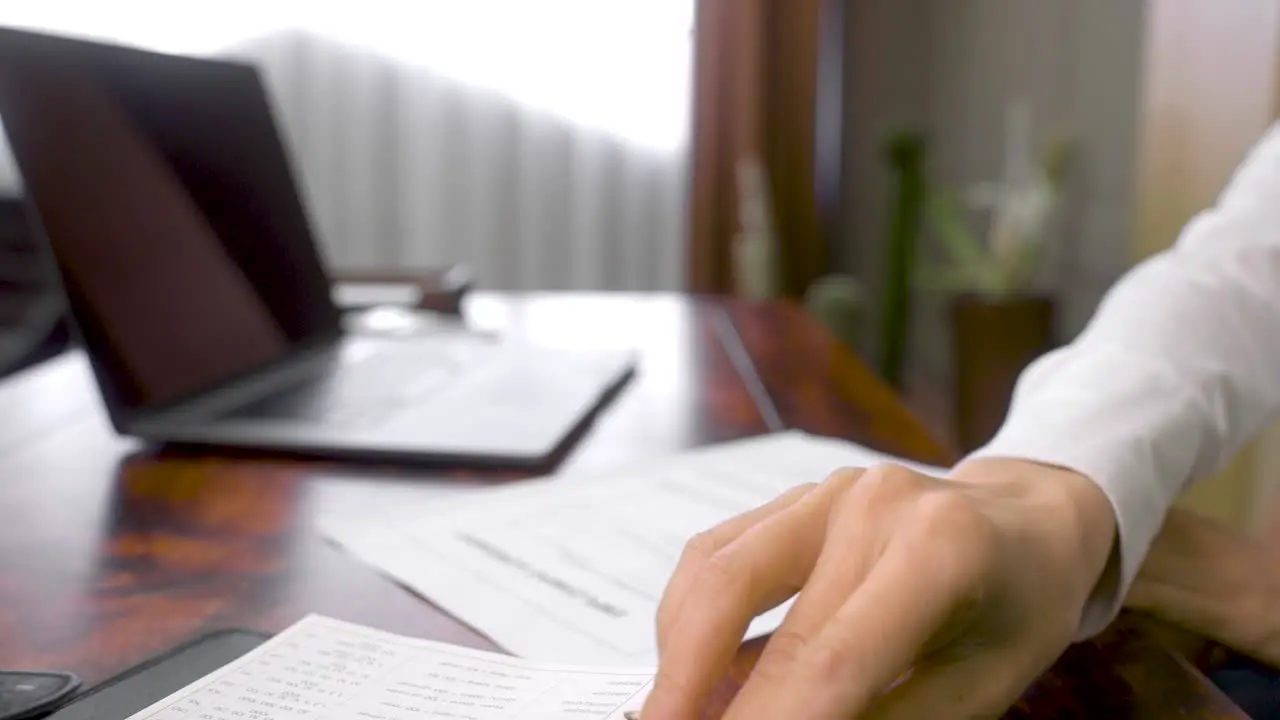 Close Up Of An Unrecognizable Employee And Boss Signing The Employment Agreement At The Office