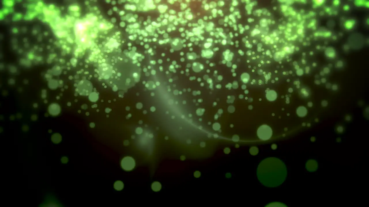 Green bokeh and particles falling Happy New Year and Merry Christmas