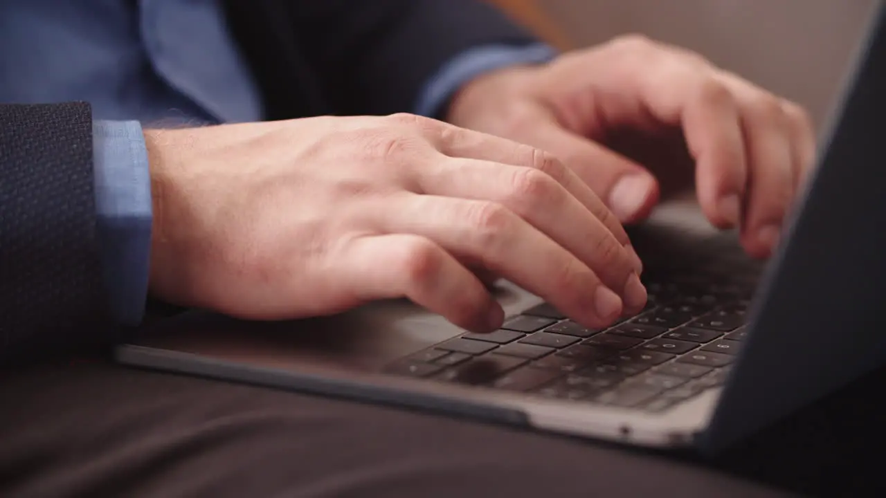 Man hands opening laptop in remote office Businessman typing on computer