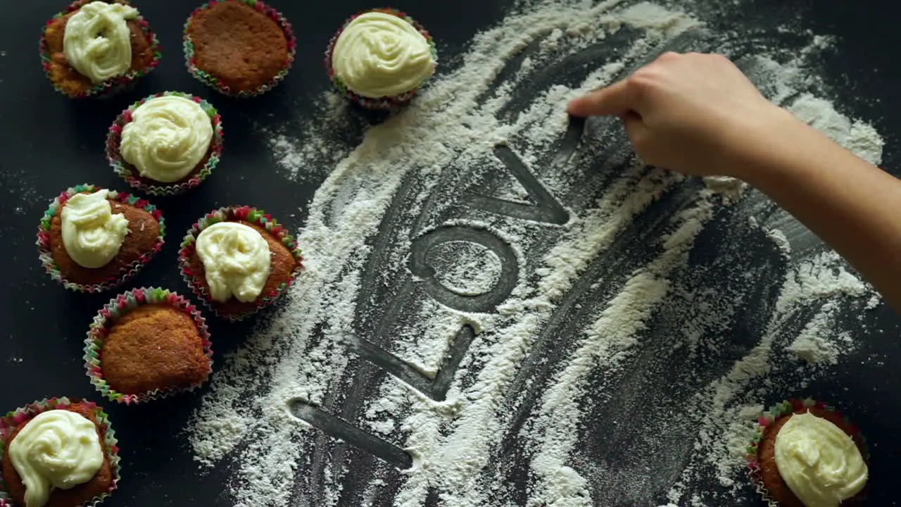 Sweet love concept Inscription I love you on white flour kitchen background