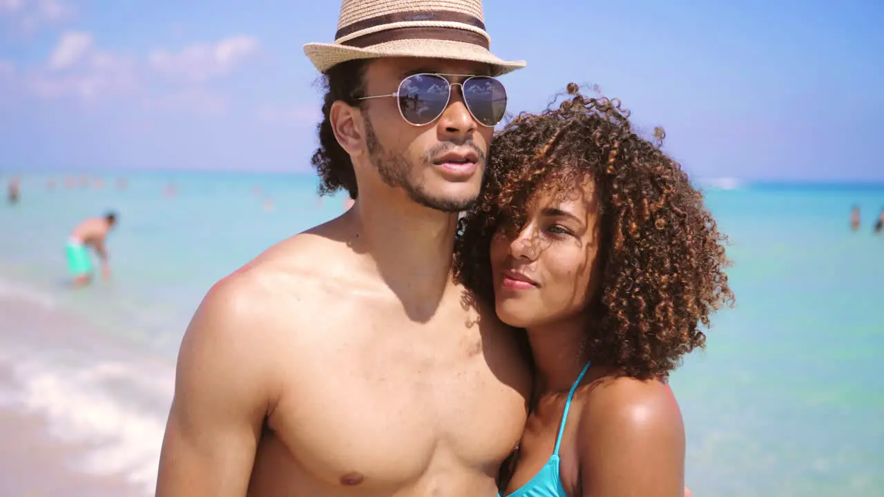 Romantic couple embracing on beach