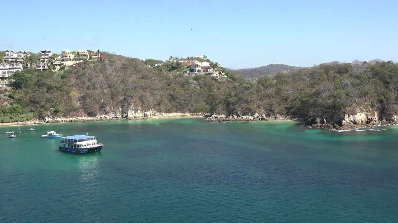 Mexico Huatulco boats and houses on hills