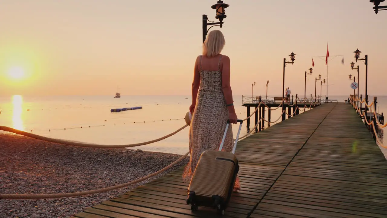 A Woman In A Developing Dress Is Hurrying Straight From The Plane To The Sea Pier To Enjoy Peace And