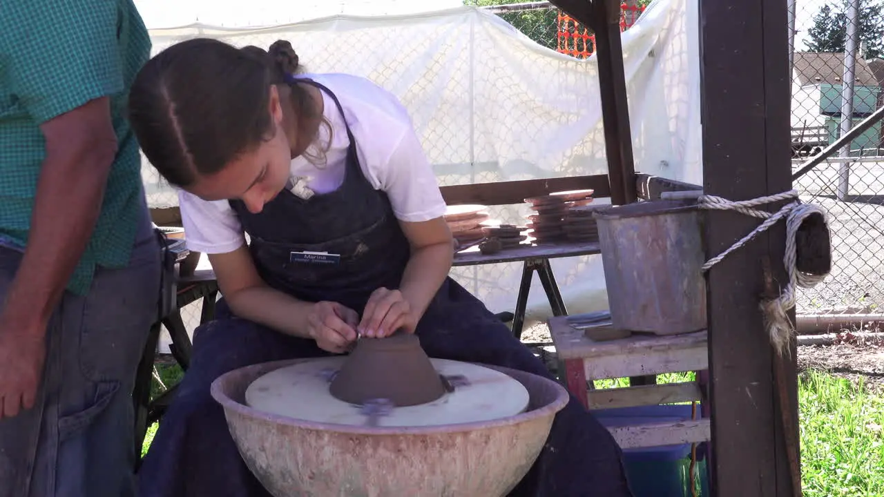 Kutztown Pennsylvania July 1 2019 A girl making pottery at the Kutztown Fair in Kutztown Pennsylvania on July 1 2019