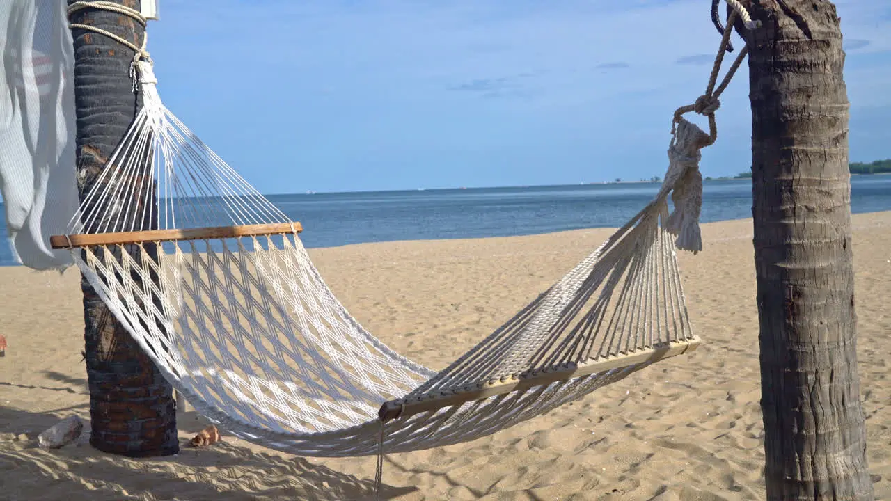 Empty cradle with sea beach background