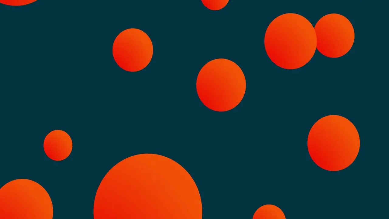 Multiple orange spheres moving against blue background