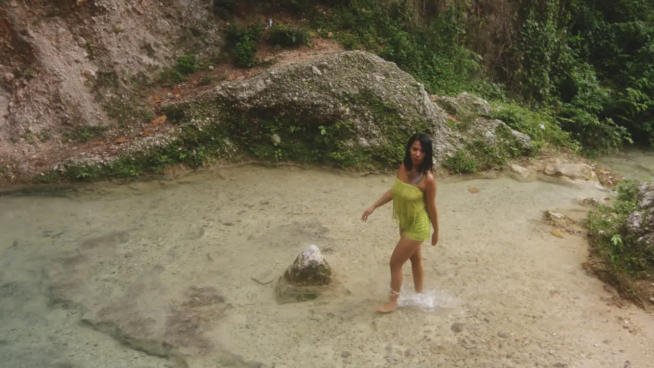 Woman Exploring the Beautiful Balneario Mata de Maiz Waterfall in the Dominican Republic