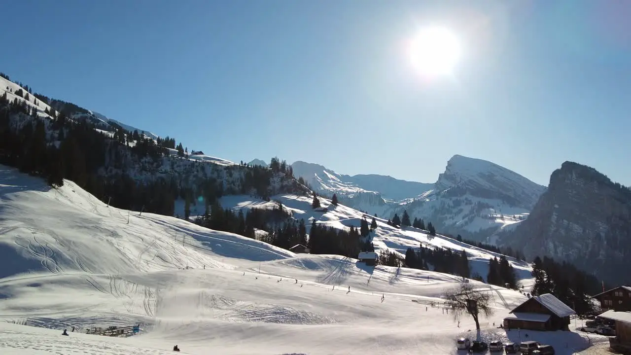 Ski and sledge slopes in the Swiss Alps on a sunny day