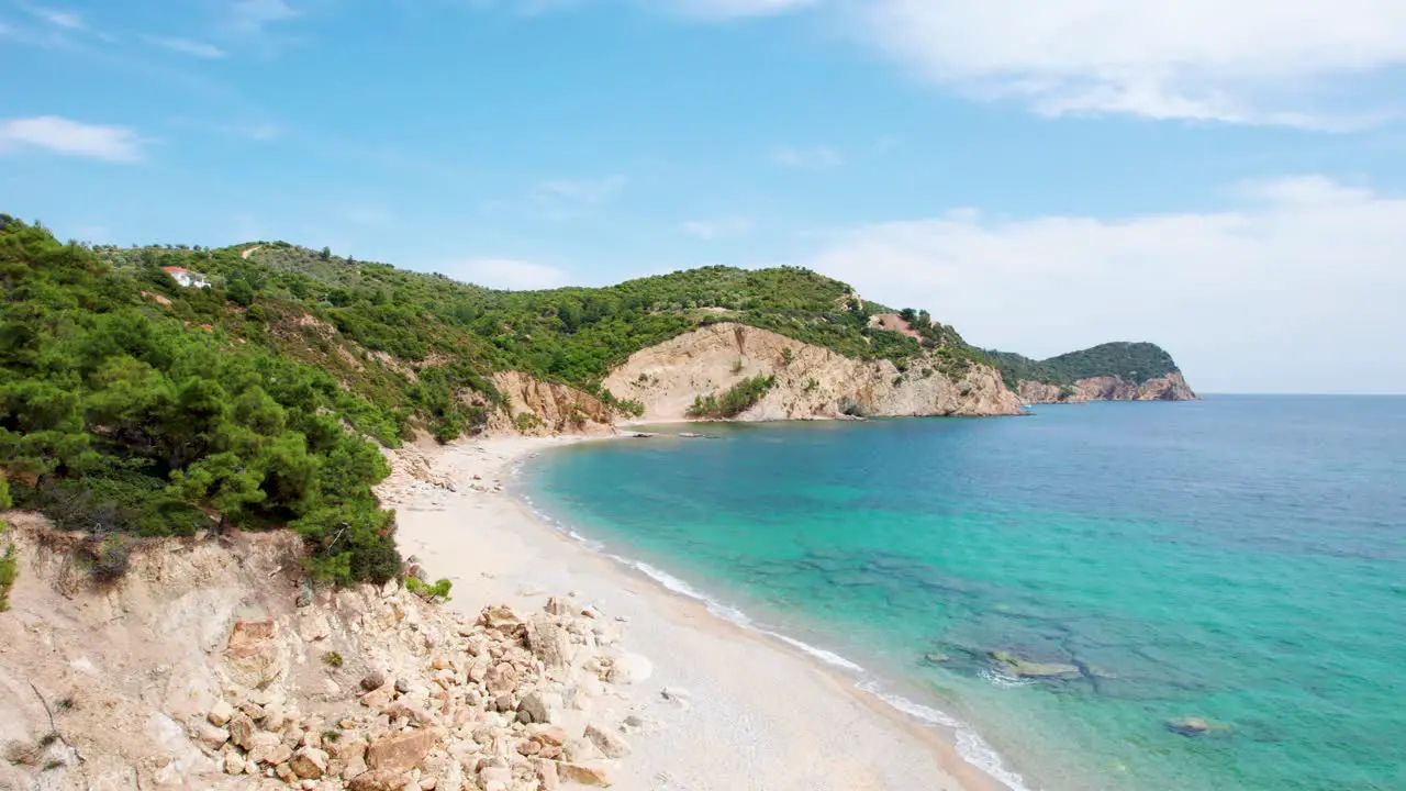 Isolated And Empty Beach With White Sand Turquoise Water Lush Vegetation And Birds Flying Around Fari Beach Thassos Island Greece Europe