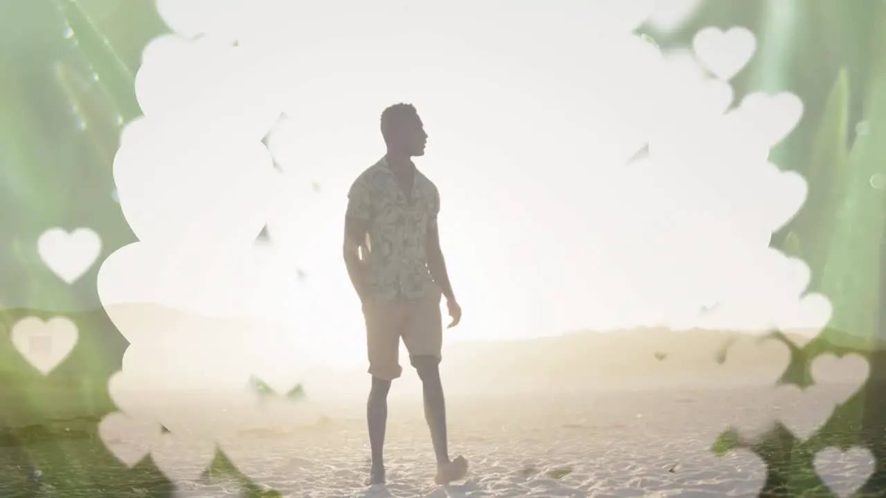 Animation of banner with copy space over african american man walking at the beach