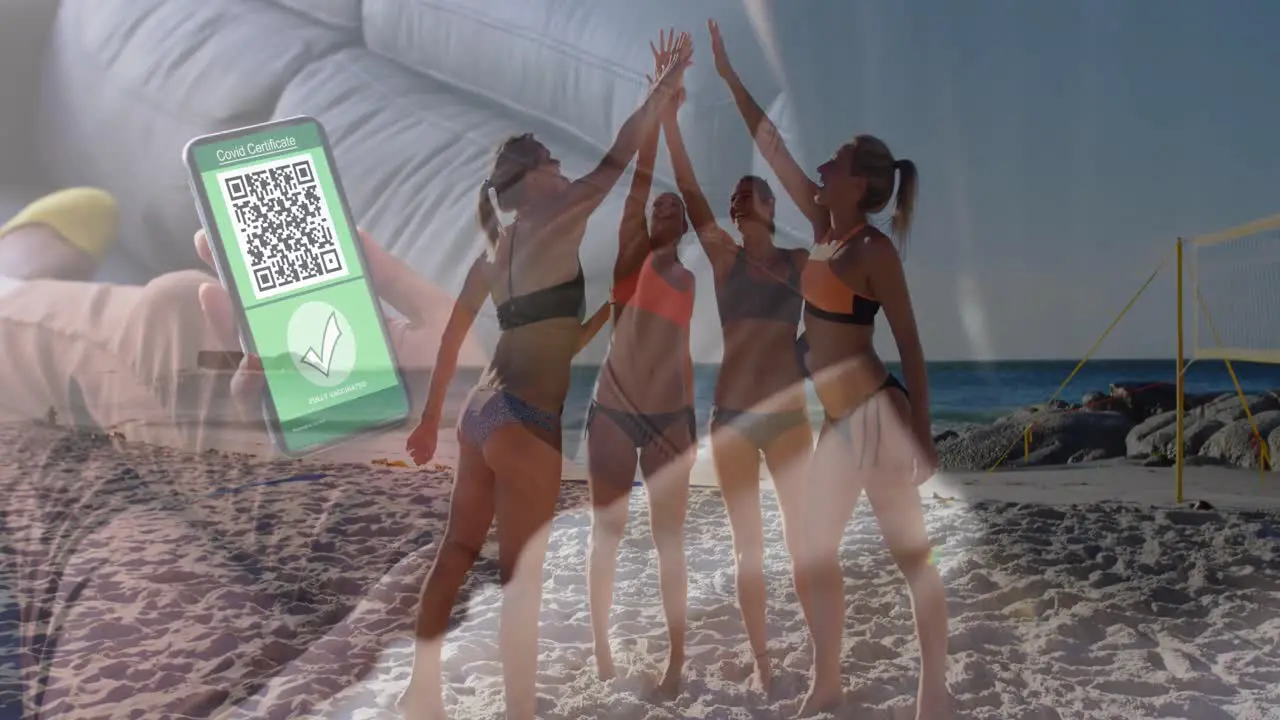 Animation of caucasian woman with smartphone with covid passport over women on beach