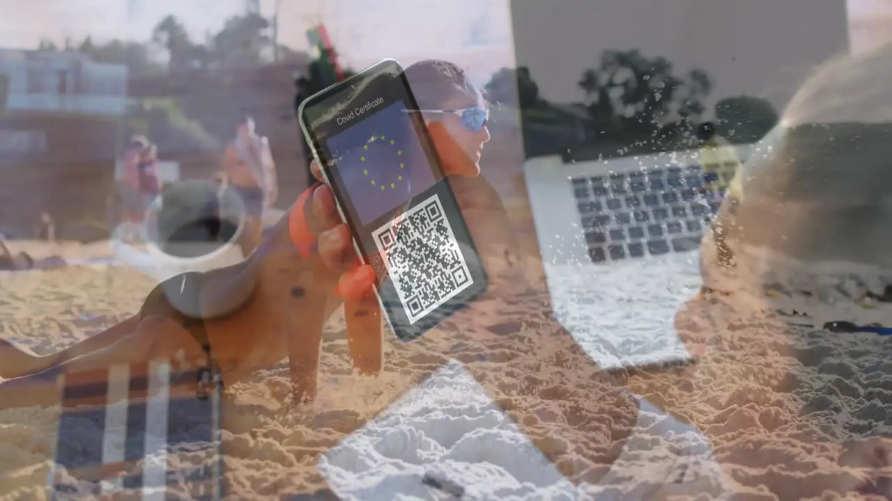 Animation of woman with covid passport on smartphone over woman playing volleyball on beach