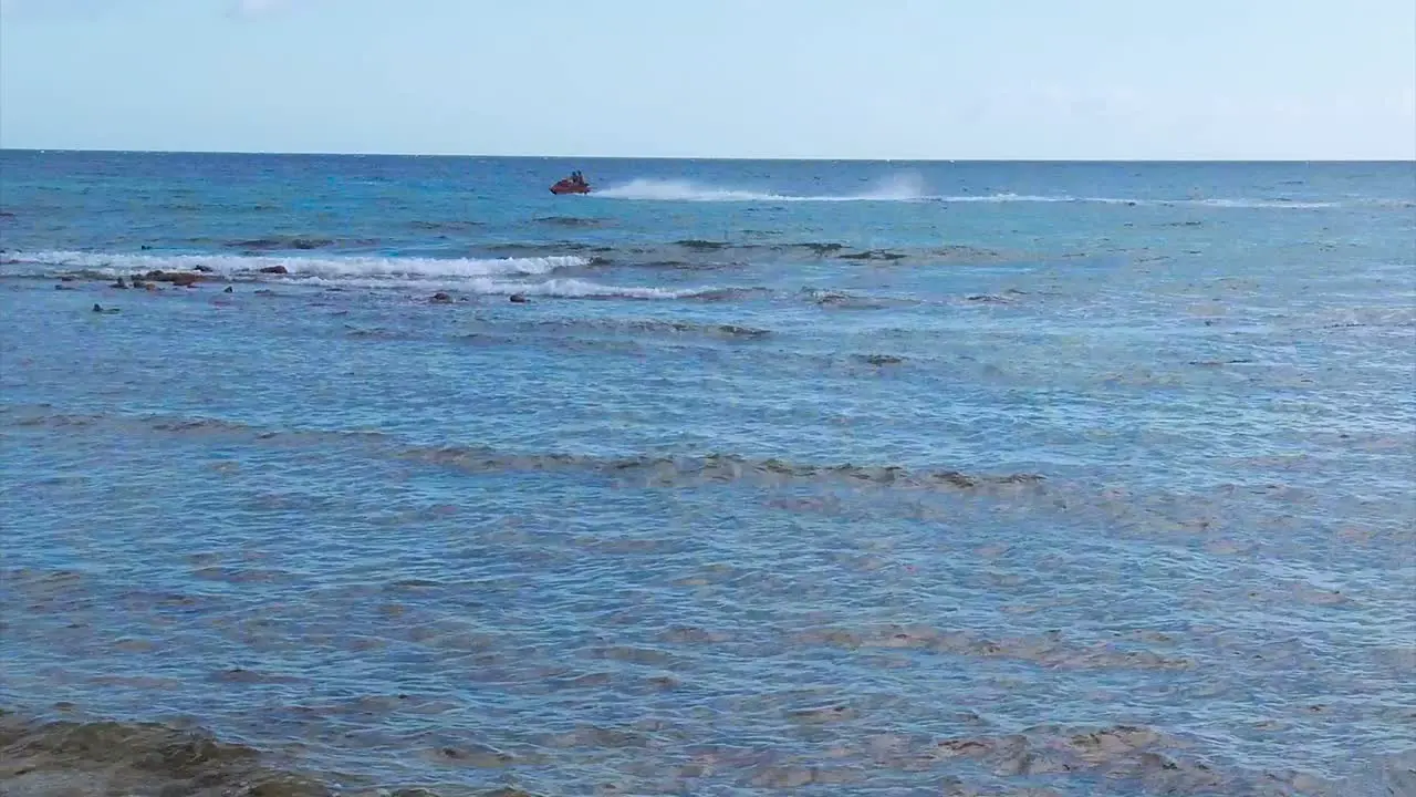 Passing on a jet ski on the Caribbean ocean