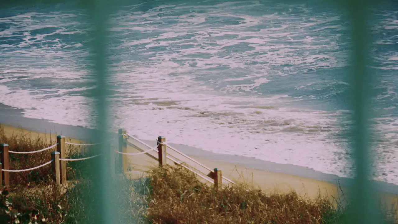 Ocean surf crashes on a private beach