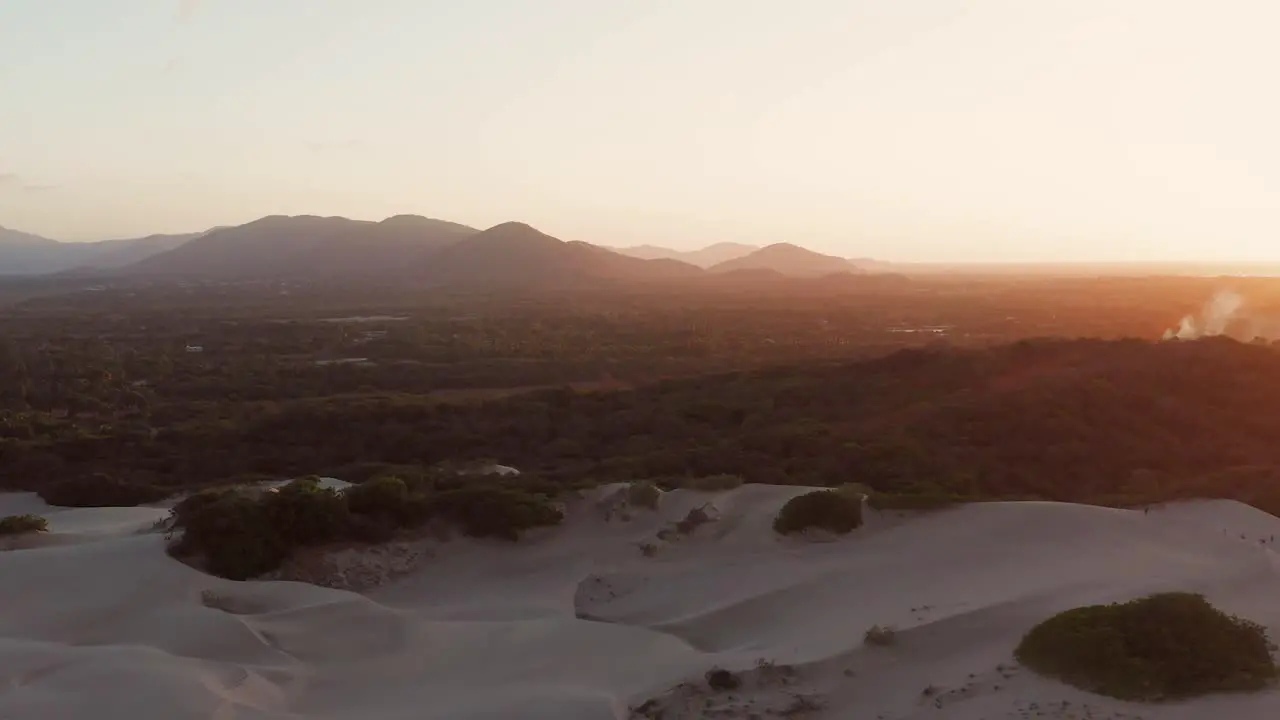 Aerial time lapse View from the dunes to the sea of Cumbuco at sunset