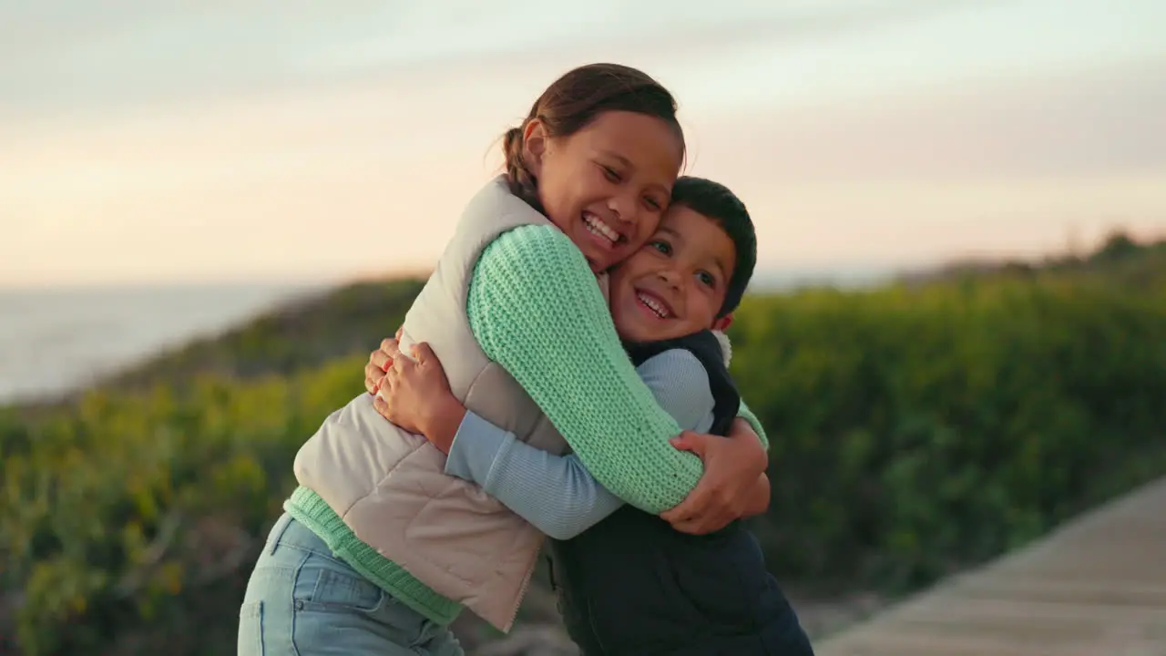 Children hug and happy at a park outdoor