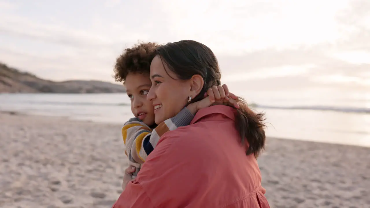 Beach mother and child hug outdoor on family