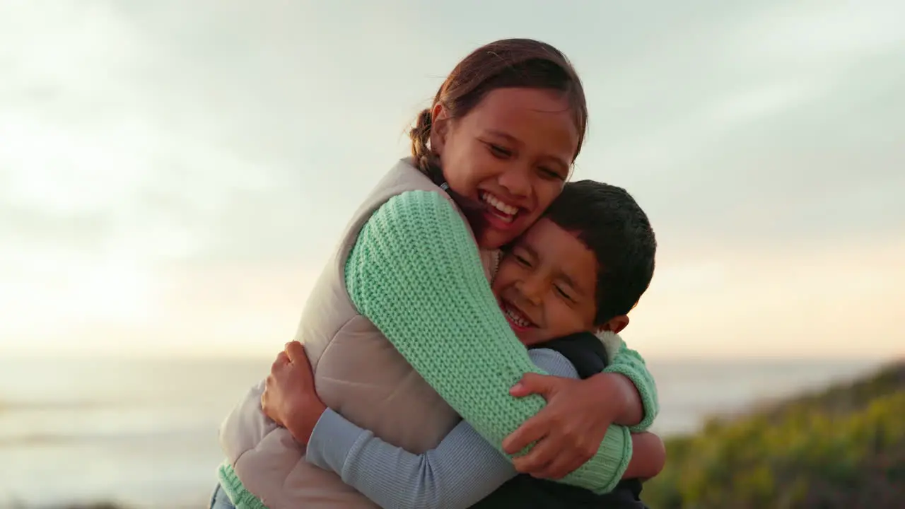 Children hug and love outdoor at the beach