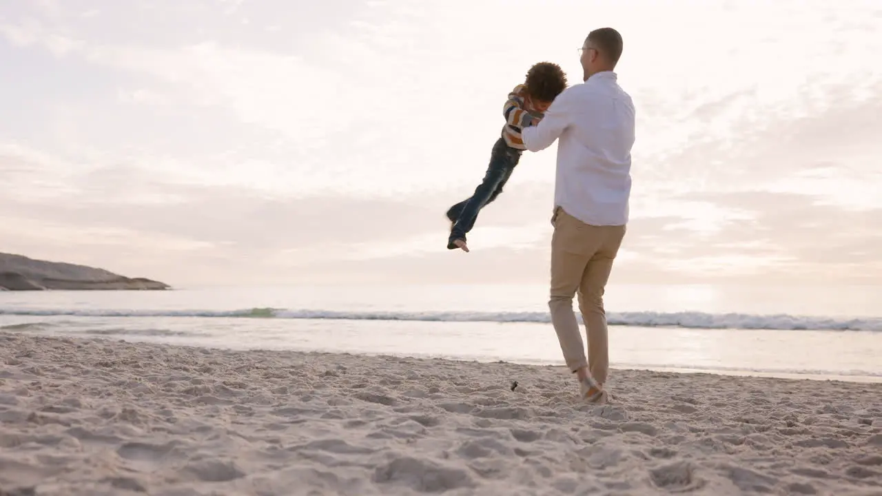 Beach happy and father spin child outdoor