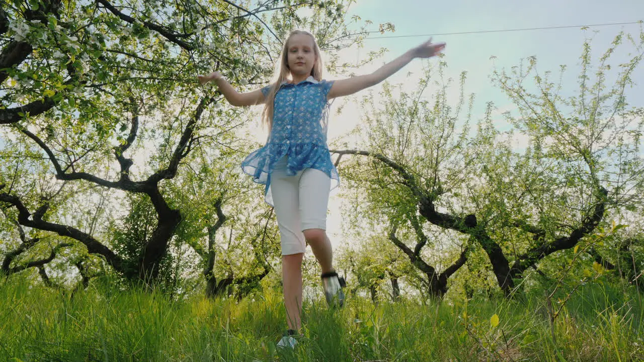 Funny Girl Dances In The Park Rejoices In Fly And Warmth