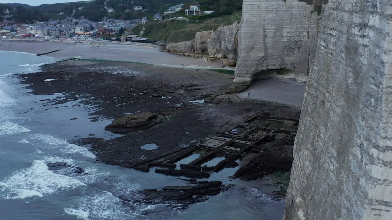 Close Up of Etretat Cliff Arch in France with Ocean View and seagull jumping off Rock