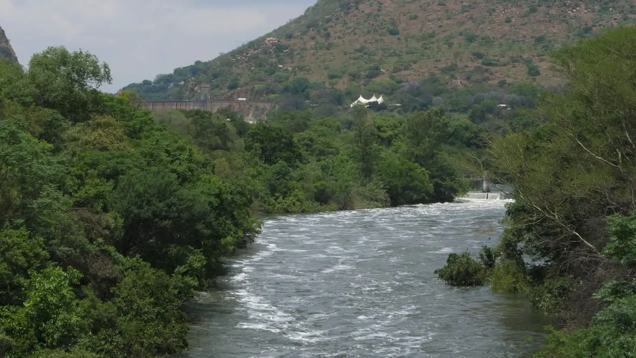 Crocodile River spring flood with Hartbeespoort Dam in distance