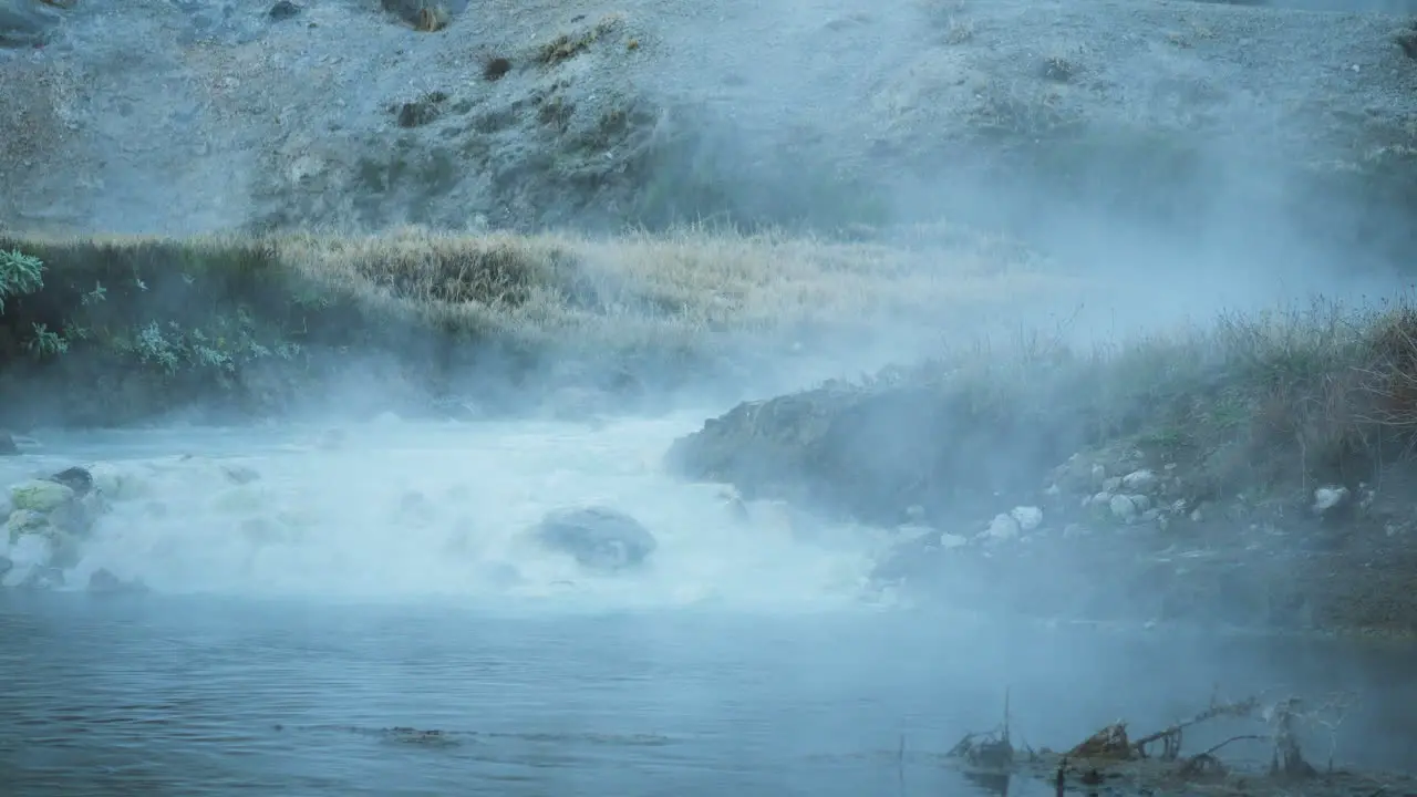 Hot Steam Rising from Famous Hot Spring Hot Creek Geological Site Inyo National Forest Low Angle