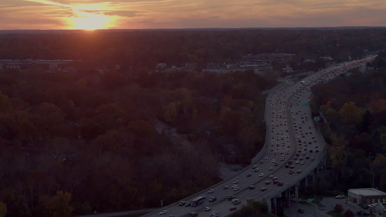 Highway traffic during rush hour at sunset in Autumn