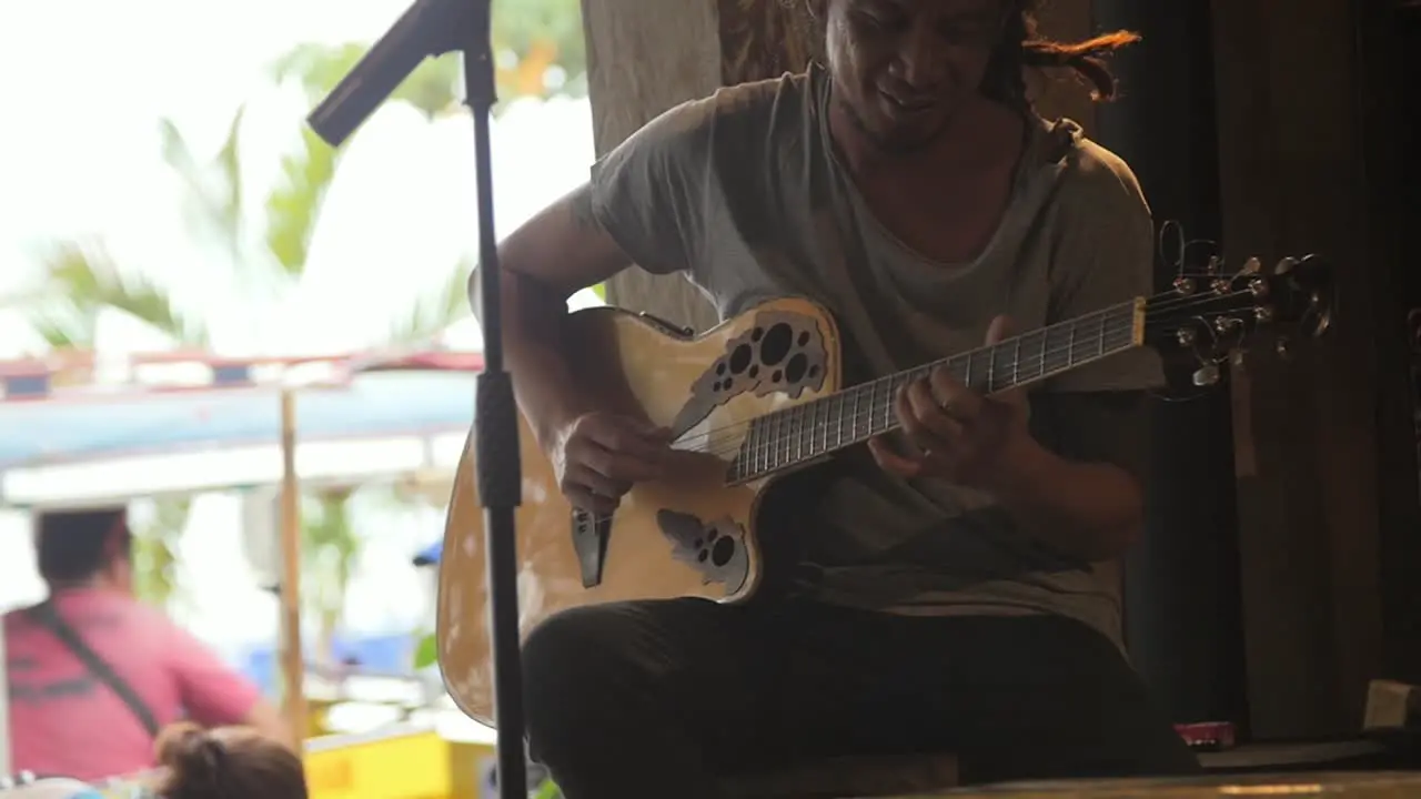 Man Playing Acoustic Guitar