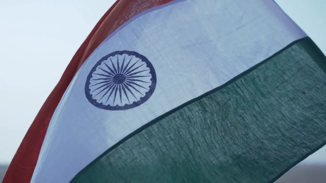 the Indian flag flapping in the sky slow motion