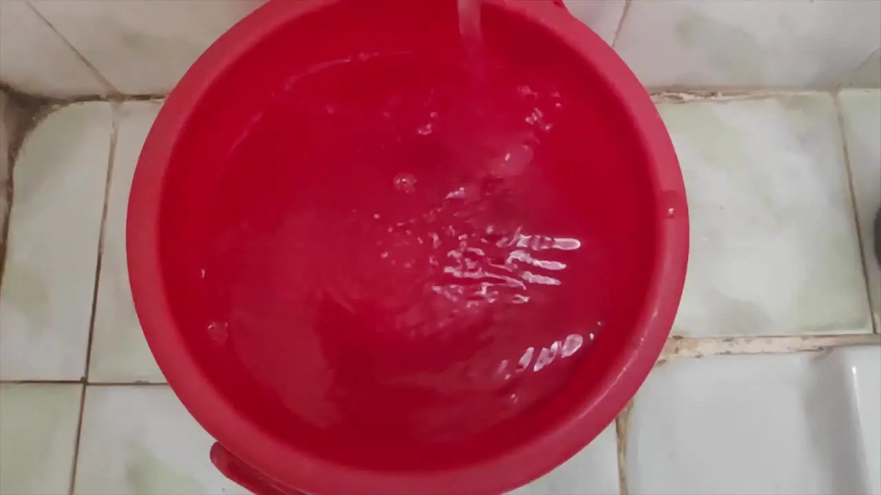 Slow Motion Video of water falling in bucket