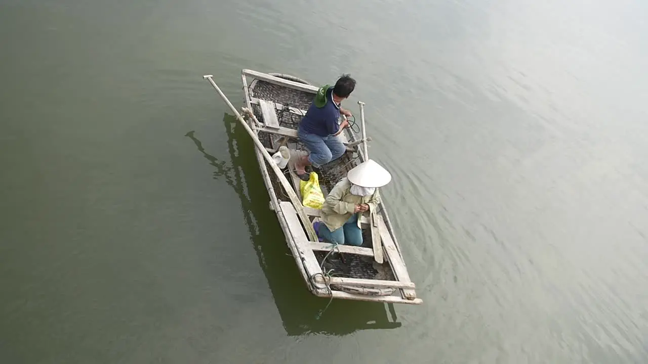 Slow Motion Tilting Shot of a Traditional Vietnamese Fishing Boat