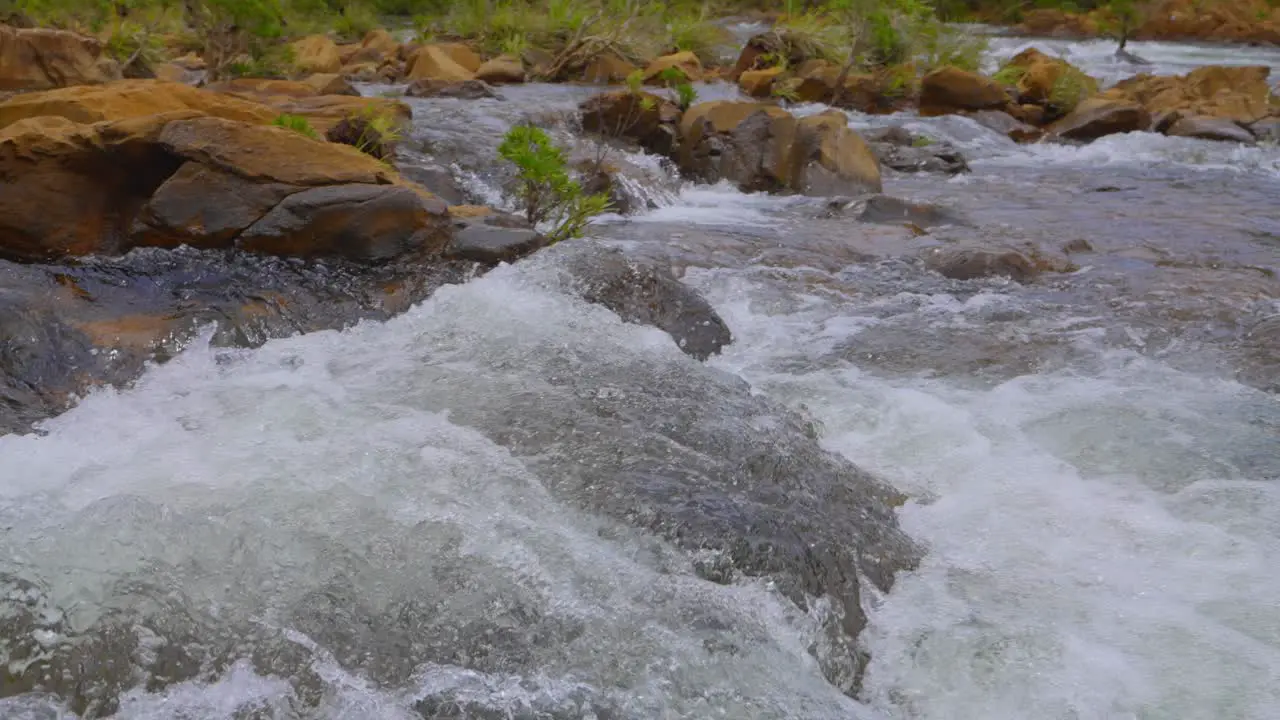 Close up shot of a river in slow motion during the day