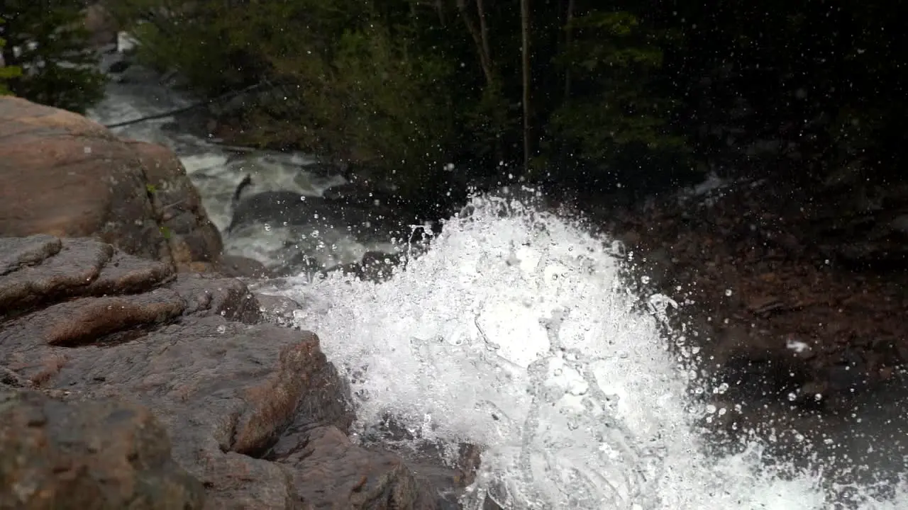 Water stream splashes in slow motion