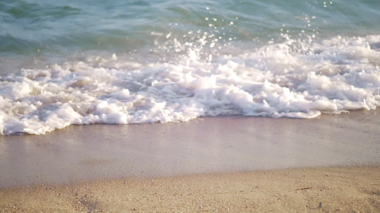 Shore and sea waves rolling in