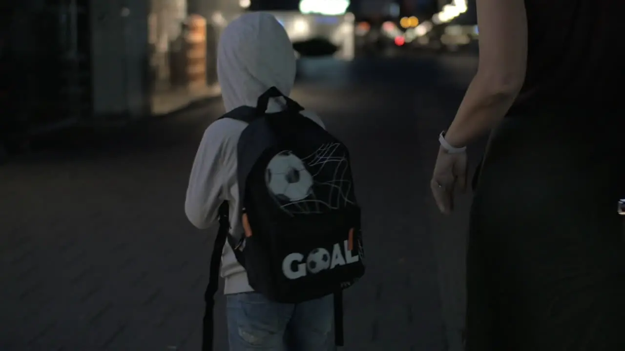 Child walking with mom and favourite toy